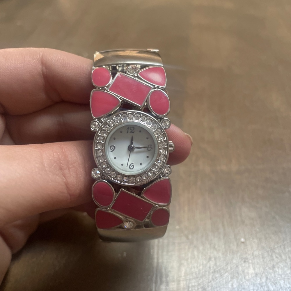 Pink and silver cuff watch
